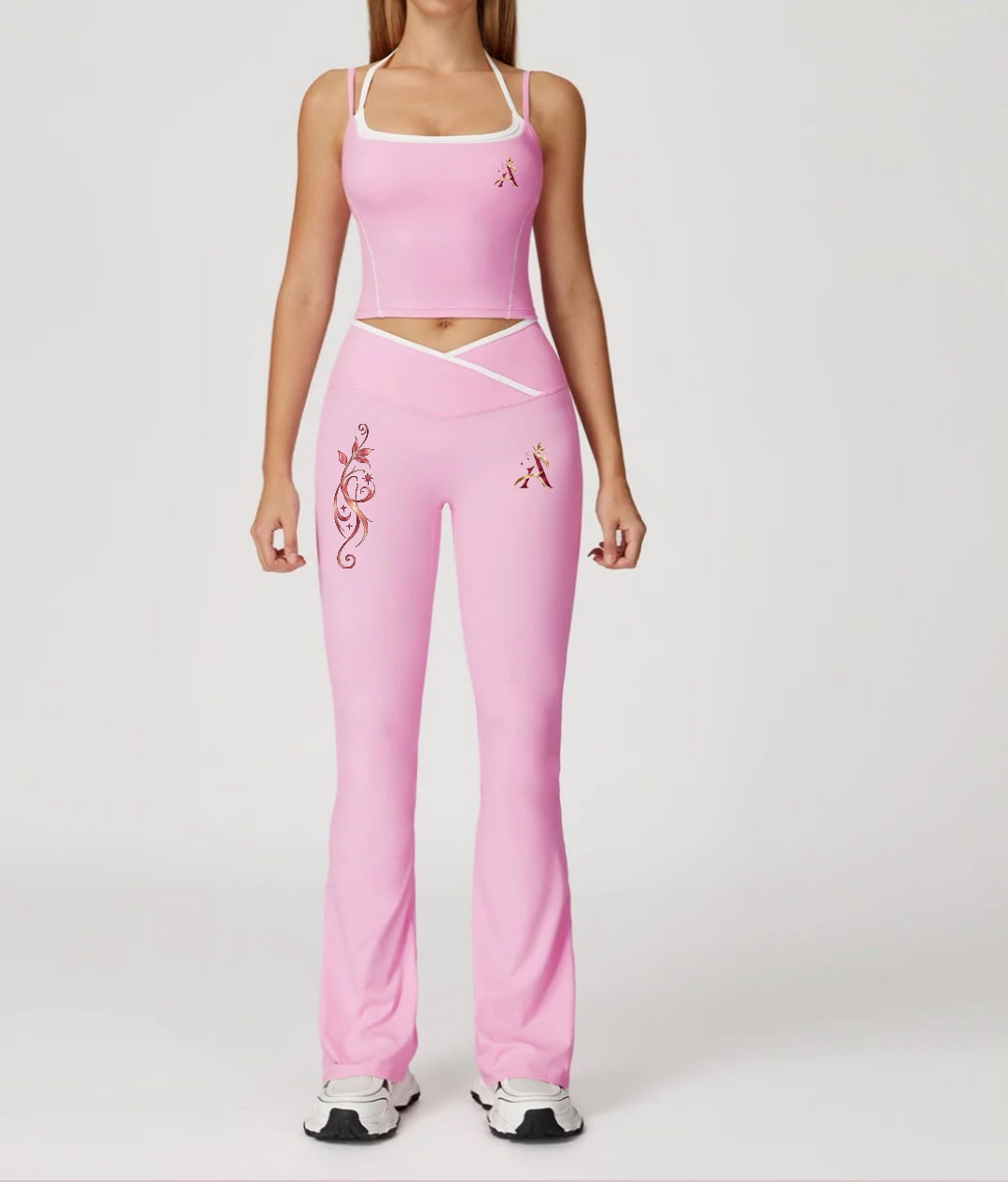 Pink contrast-trim crop top and flared leggings activewear set with Angelauraluxe branding