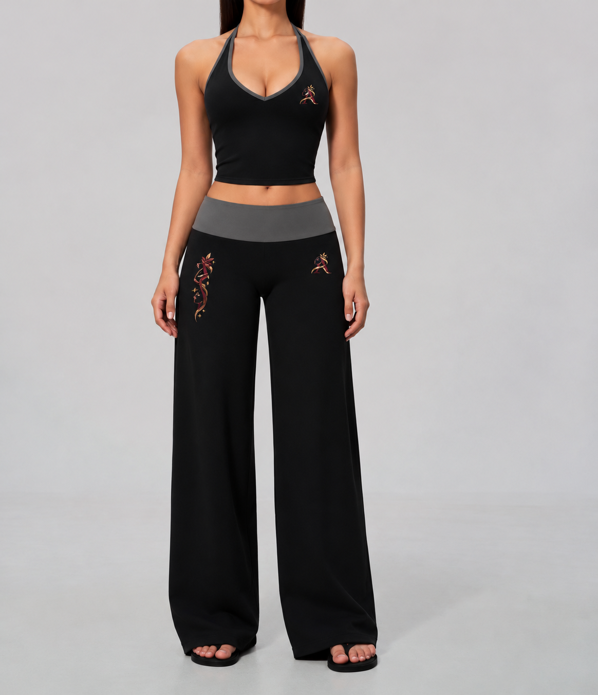 Halter crop top and high-waisted wide-leg pants in a color-block design